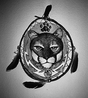 "Cougar Spirit" Native American style Pen and ink, and white acryllic on suede shield with willow switch hoop frame.